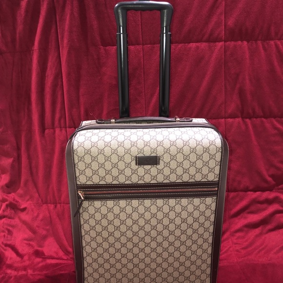 Gucci Handbags - 100% AUTHENTIC GUCCI ROLLER SUITCASE  *NEW*